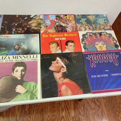 Record Albums Lot George Benson Barry Manilow Santana Righteous Brothers Olive Physical Bayou Country