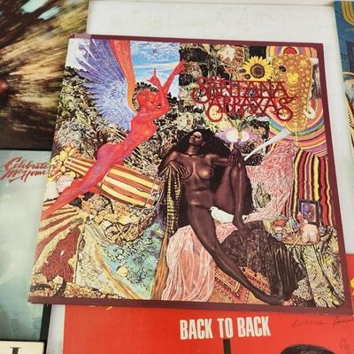 Record Albums Lot George Benson Barry Manilow Santana Righteous Brothers Olive Physical Bayou Country