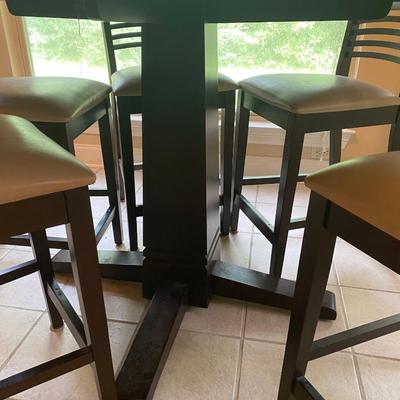 Dark wood round high table w/5 chairs