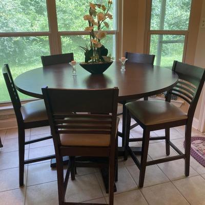 Dark wood round high table w/5 chairs