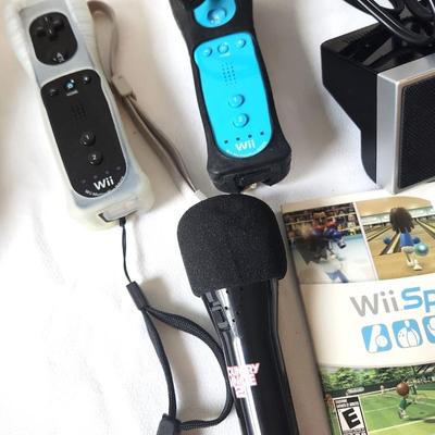 Lot #58 Wii Lot - 8 games, Box, Microphone, Controllers