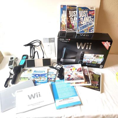 Lot #58 Wii Lot - 8 games, Box, Microphone, Controllers