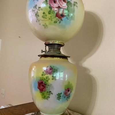 Antique floral oil lamp