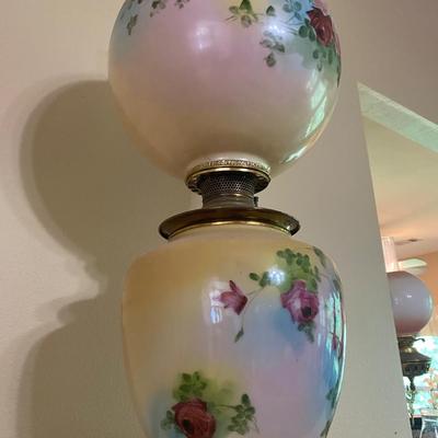 Antique floral oil lamp