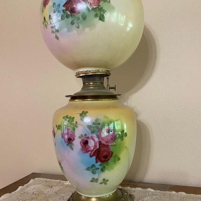 Antique floral oil lamp