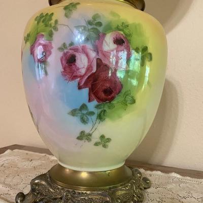 Antique floral oil lamp