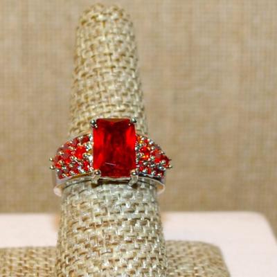 Size 8 Deep Red Emerald Cut Center Stone Ring and Red Accents Stone on a .925 Silver Band (6.8g)