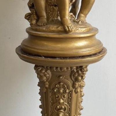Large Gilt Coated Cherubs on a Stand