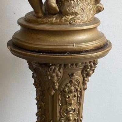 Large Gilt Coated Cherubs on a Stand