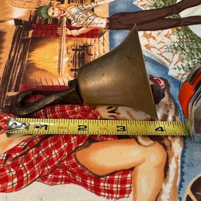 Antique brass overhead door bell