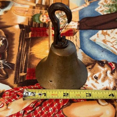 Antique brass overhead door bell