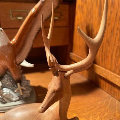 D37-Wood Carving, egg shaped stones and eagle figurine
