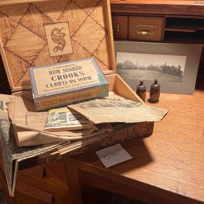 D40-wooden box, old newspapers, and photo, etc.