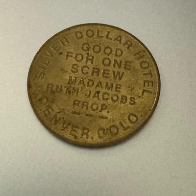 Silver dollar hotel token