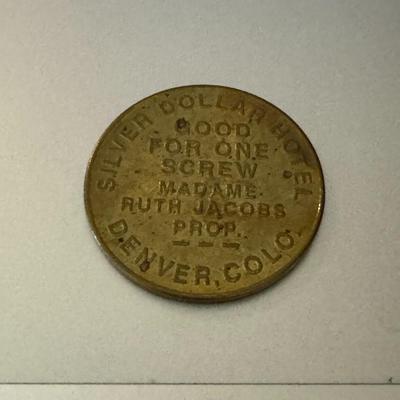 Silver dollar hotel token