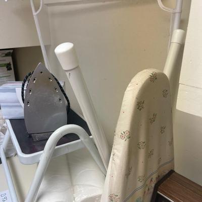 D92-clothes pins, stepstool, Kleenex, and toilet tissue, iron, drying rack, and ironing board