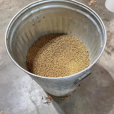 Trash can 1/2 full of fish food
