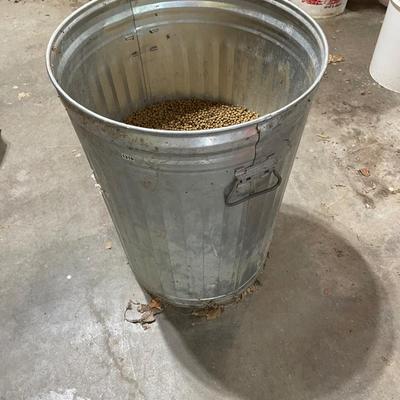 Trash can 1/2 full of fish food
