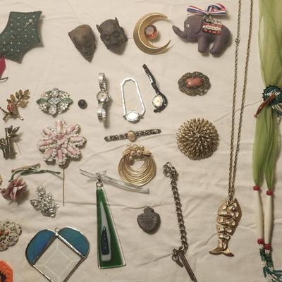 Jewelry lot including Some Vintage Jewelry, Rhinestone brooches, Fuzed Glass