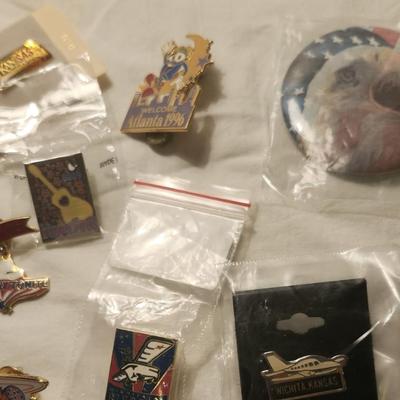 Vintage buttons and pins including Wichita river festival the greeting