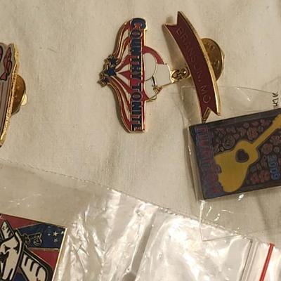 Vintage buttons and pins including Wichita river festival the greeting