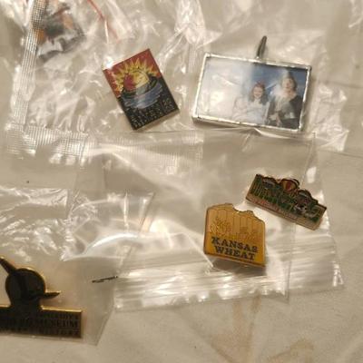 Vintage buttons and pins including Wichita river festival the greeting