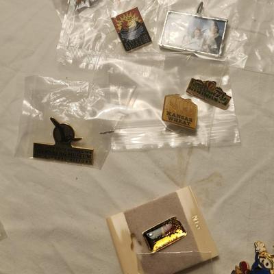 Vintage buttons and pins including Wichita river festival the greeting
