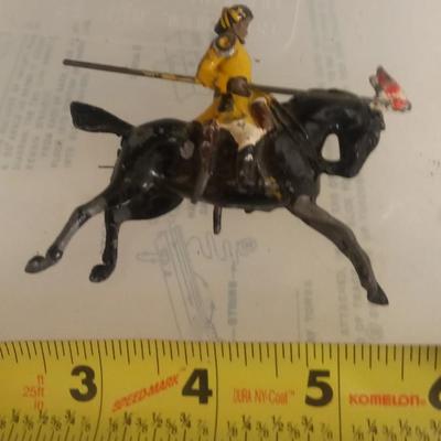 LOT 108 TWO EARLY LEAD HORSE SOLDIERS