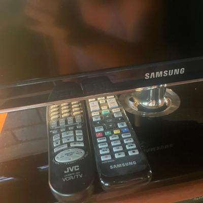 P8-Television and VCR with remotes