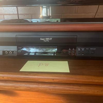 P8-Television and VCR with remotes