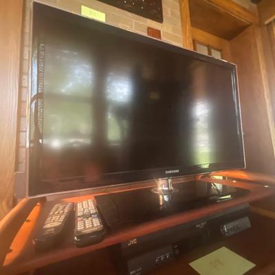 P8-Television and VCR with remotes