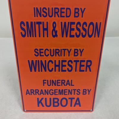 Insured By Smith & Wesson Metal Sign