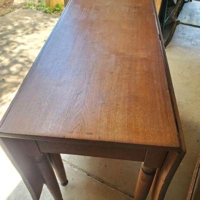 Drop leaf table folded down 