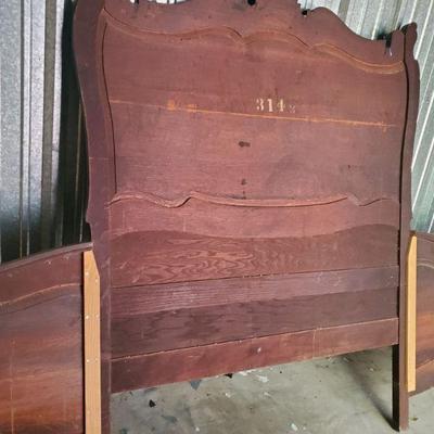 antique head board back side from a full into a king 