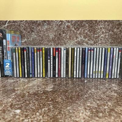 Lot of CDs, DVDs and Tapes
