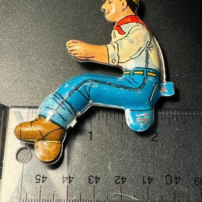 Tin Litho toy man driver