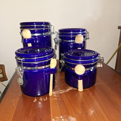 4 blue canisters