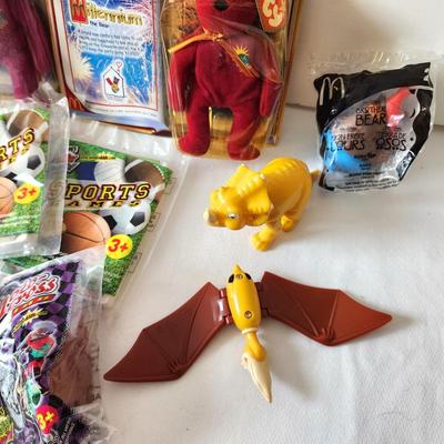 Lot #109 Lot of 12 New in package Fast Food Toys - 2 pieces Land Before Time