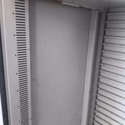 METAL STORAGE CABINET W/ACCORDION DOOR AND ADJUSTABLE SHELVES