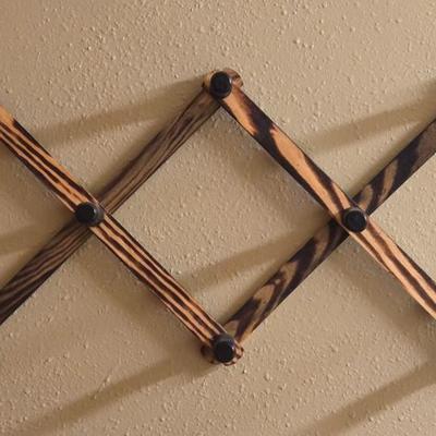 Accordion hat Rack