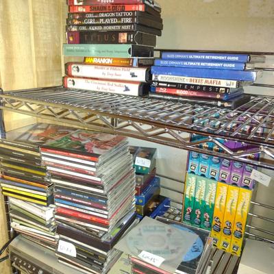 Collection of CDs, DVDs, and VHS