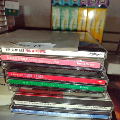 Collection of CDs, DVDs, and VHS
