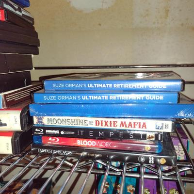Collection of CDs, DVDs, and VHS