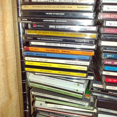 Collection of CDs, DVDs, and VHS