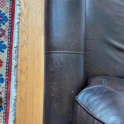 Brown Leather Armchair and Ottoman
