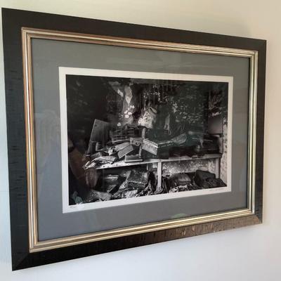 Black and white print of nude women surrounded by home items