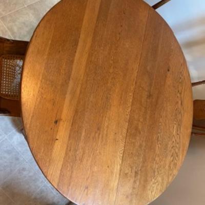 Antique Oak Dinning Table and 2 Chairs. Included 3 leaves