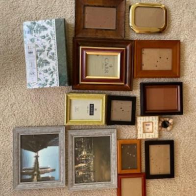 A lot of frames and photo album