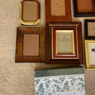A lot of frames and photo album