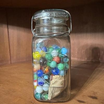 A Collection of Ohio Trinkets, Marbles, Rockingham Glaze Mug and Other Items
